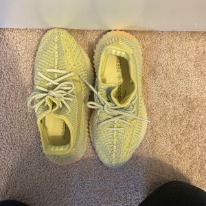 Yeezys. yellow and grey. Size 4. Never worn